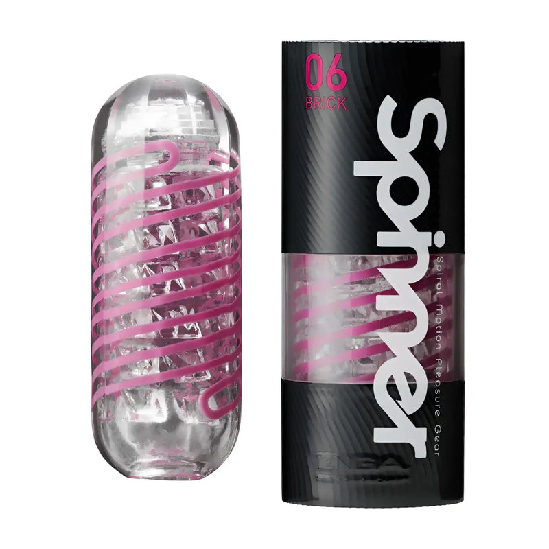 Clear cylinder with pink spiral of TENGA SPINNER 06 BRICK sex toy on drying stand