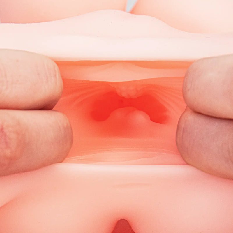 Pink silicone anal plug in soft skin otokonoko torso with anal tunnel