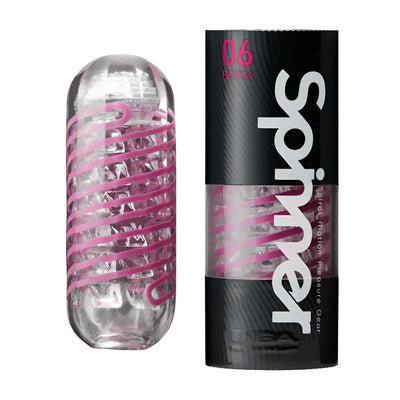 Clear cylinder with pink spiral of TENGA SPINNER 06 BRICK sex toy on drying stand