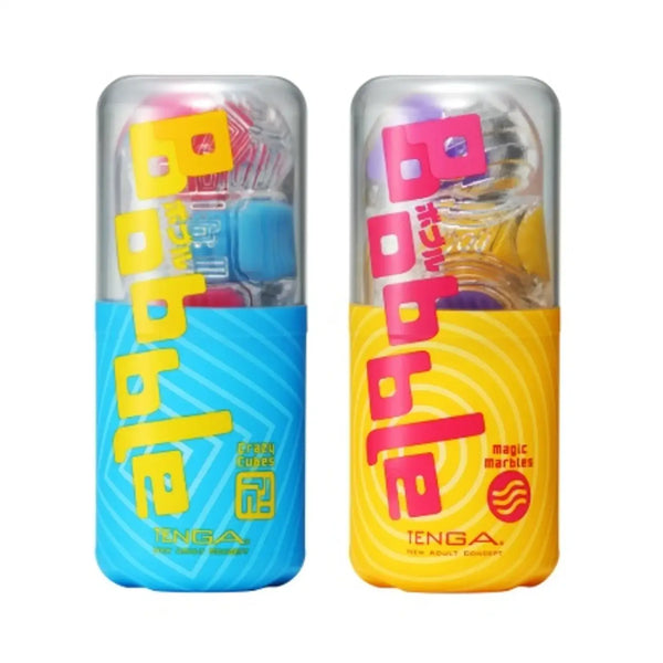 Two colorful TENGA BOBBLE CRAZY CUBES packages, one blue and one yellow, with crazy cubes inside
