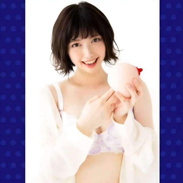 Smiling woman holding round object for Junyuu Meiki Ishihara Boob-Shaped Onahole