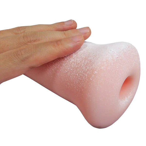 Hand holding a pink Fleshlight next to Onahole Disinfectant Powder 45g for clean fun