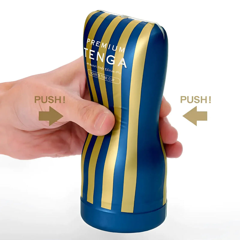 Blue and gold striped Tenga premium soft case cup with vacuum hole for a smooth experience