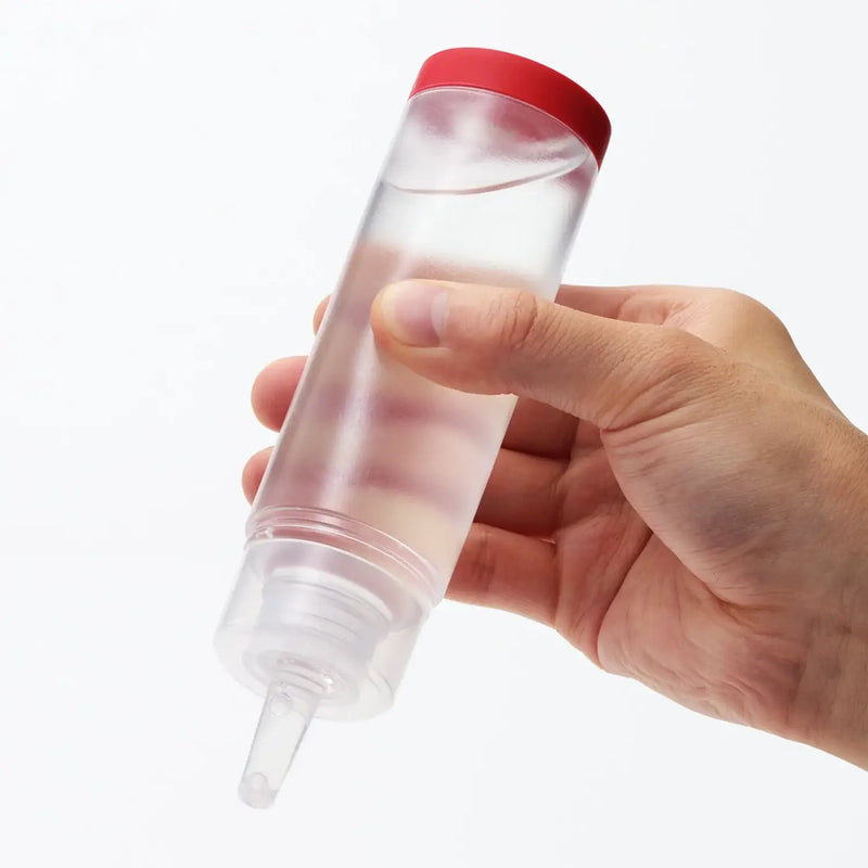 Clear plastic squeeze bottle with red cap for TENGA LOTION LIGHT sex toy use