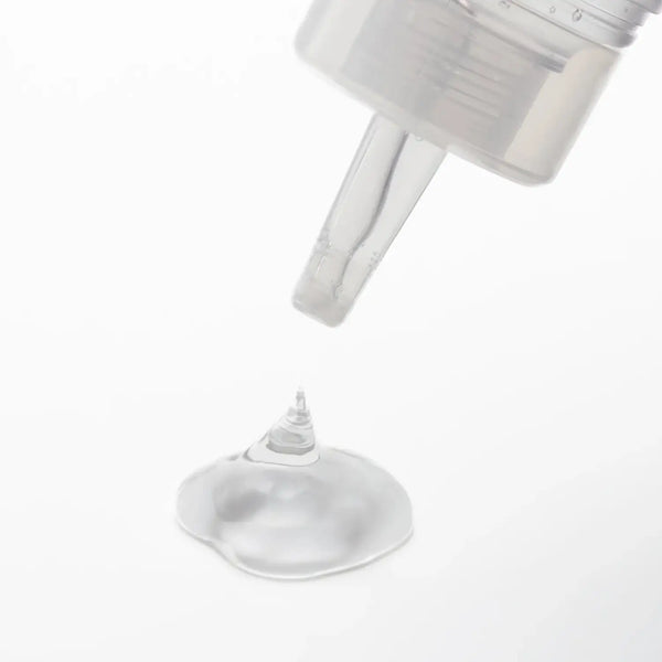 TENGA LOTION REGULAR clear liquid being dispensed from a transparent pump bottle for smooth sex toy use