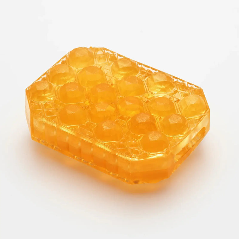 TENGA UNI TOPAZ sex toy with translucent orange honeycomb silicone mold, great features