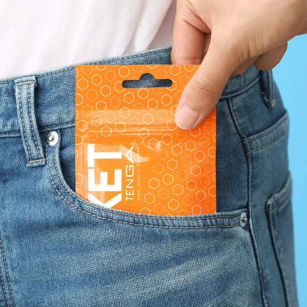 Orange pouch with hexagonal pattern from POCKET TENGA CRYSTAL MIST sex toy collection