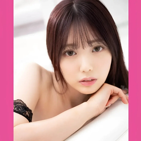 Asian woman with dark hair using Mio Ishikawa Dual-Hole Masturbator showcasing product features