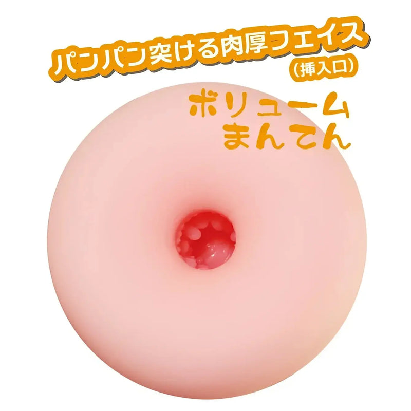 Pink donut-shaped sexual pleasure toy with textured red inner opening made from safe skin material