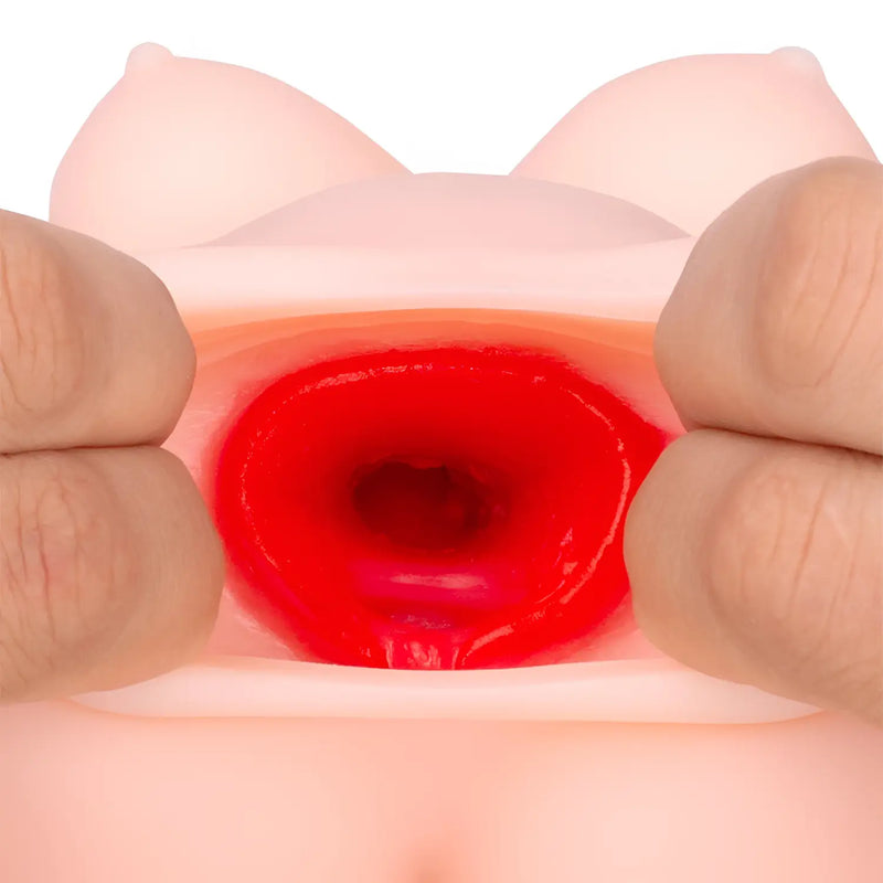 Pink silicone breast toy in Seiraku Toys secret spellbook onahole