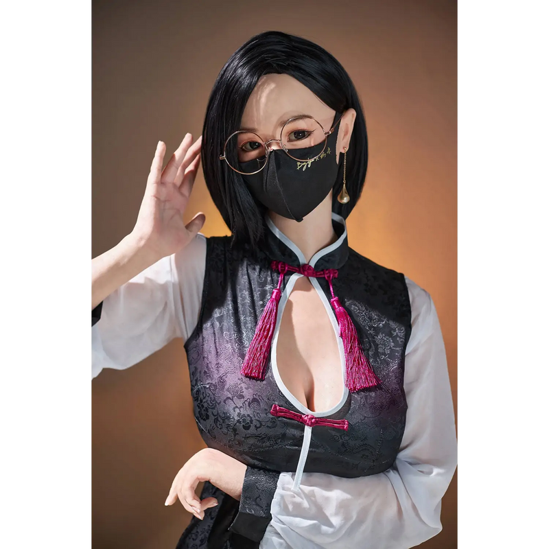 Aitia Naimi realistic sex doll in black mask with pink bow tie accents