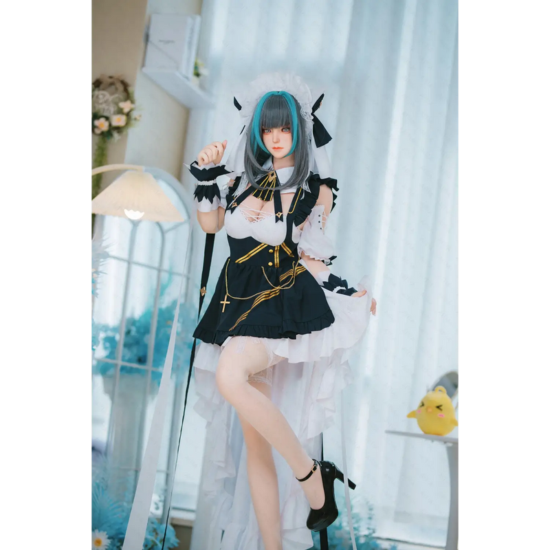 Black and white lace AITIA Cheshire silicone sex doll with gold accents, feathered cuffs