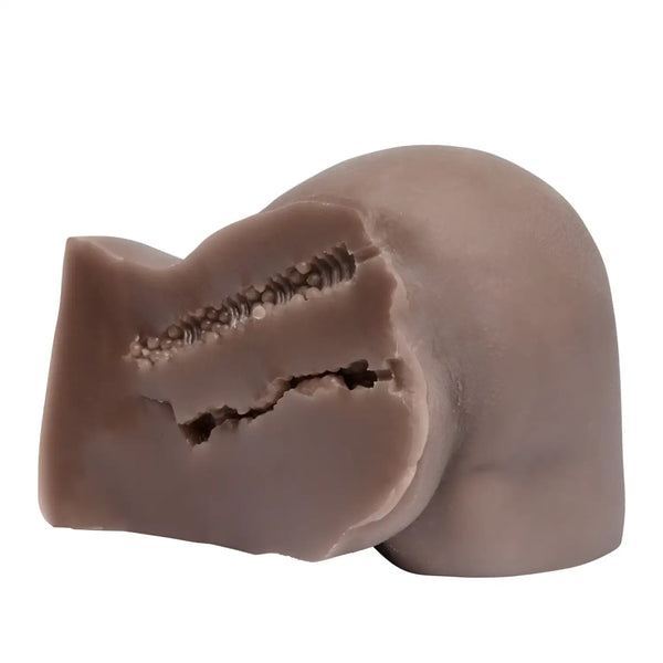 Brown silicone standing Ruri-nyan skull with triple-cervix vaginal texture