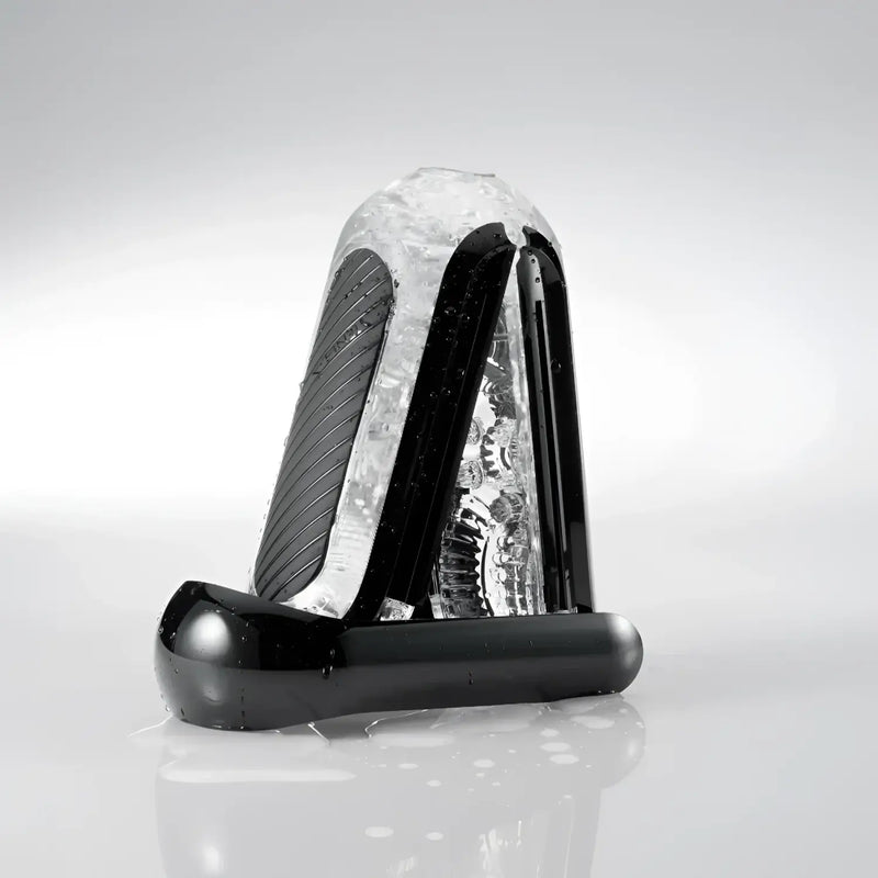 Black TENGA FLIP HOLE ZERO BLACK ice cream scoop with textured inner surface