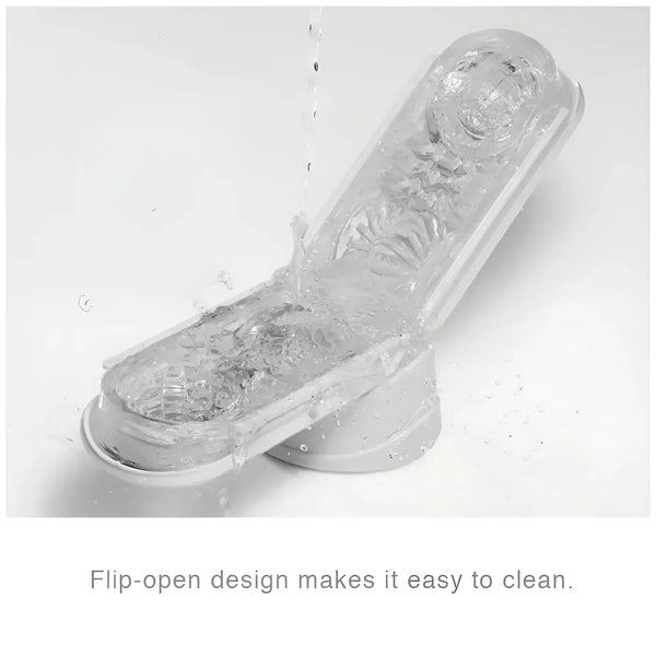 Translucent TENGA FLIP HOLE ZERO WHITE pet water feeder being rinsed with water