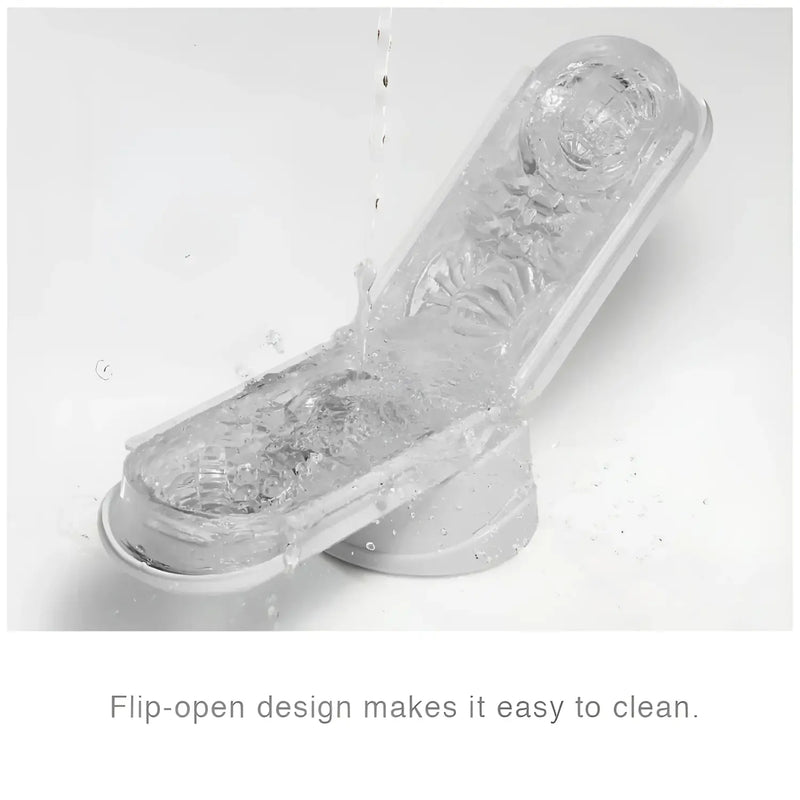 Translucent TENGA FLIP HOLE ZERO WHITE pet water feeder being rinsed with water