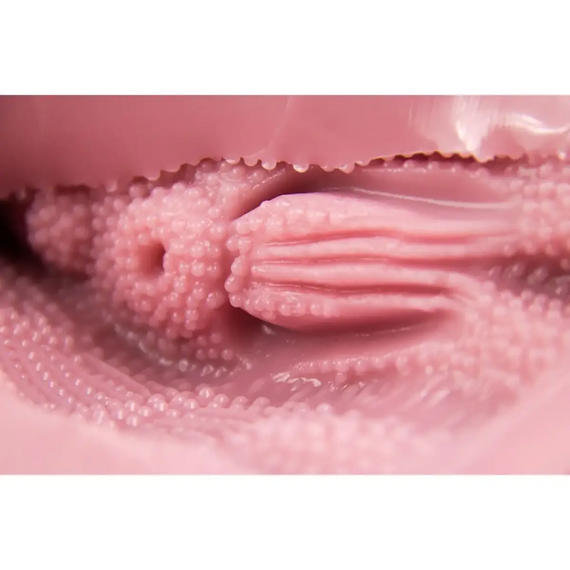 Pink TOMAX Venus Clone onahole with ridged silicone texture