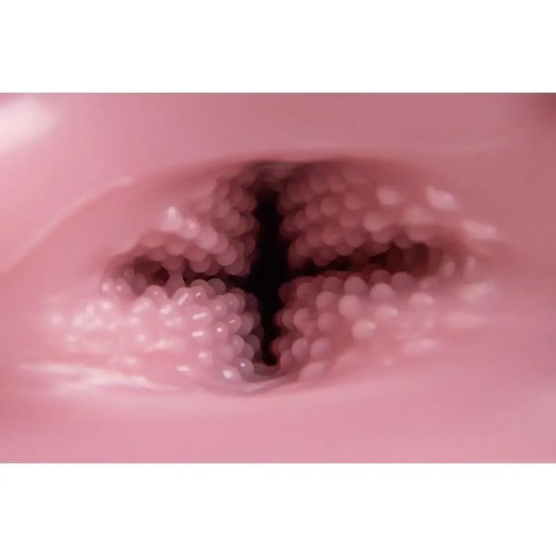 TOMAX Venus Cross onahole with pink polka dot candy floss dispenser